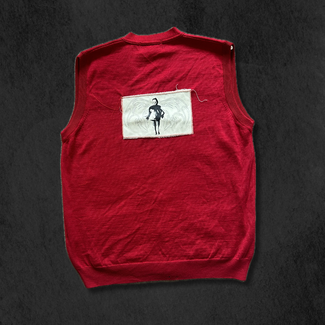 Knitwear is RED Waistcoat